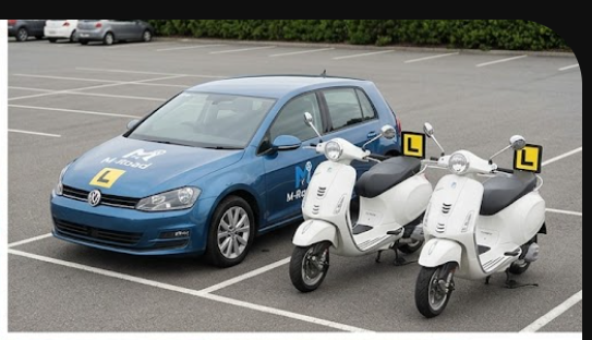 My Driving School training car and two learner scooters parked side by side